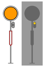 okrągła pomarańczowa tarcza z czarnym pierścieniem i białą obwódką, a pod nią biała strzała z czerwoną obwódką skierowana w dół